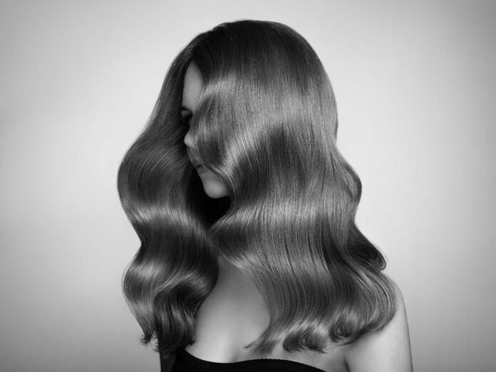 Redhead woman with curly hair