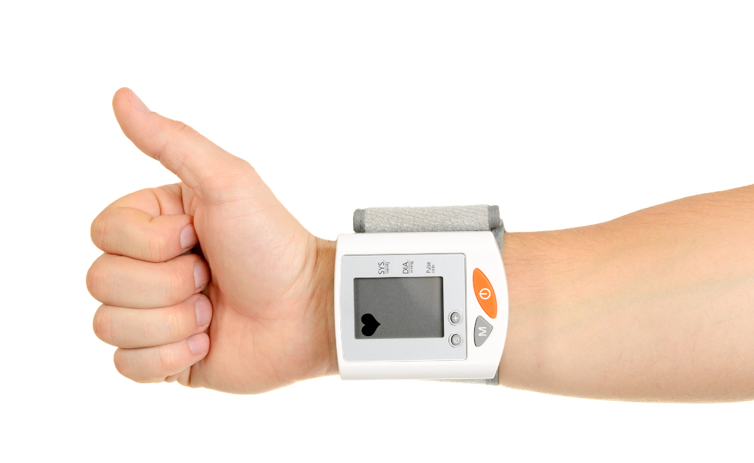 Thumbs Up for Healthy Blood Pressure isolated on white background